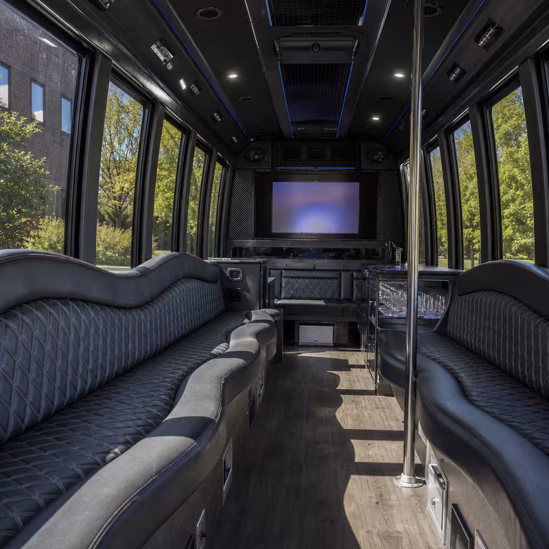 Passenger watching the Sioux Falls scenery during a regional party bus road trip