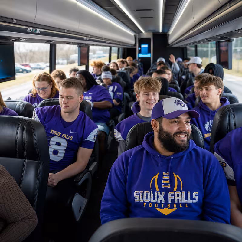 Black Mercedes Sprinter van staged for an Sioux Falls Sporting Event Transportation group